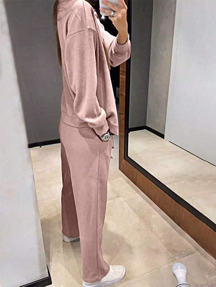różowy sweter spodnie komplet