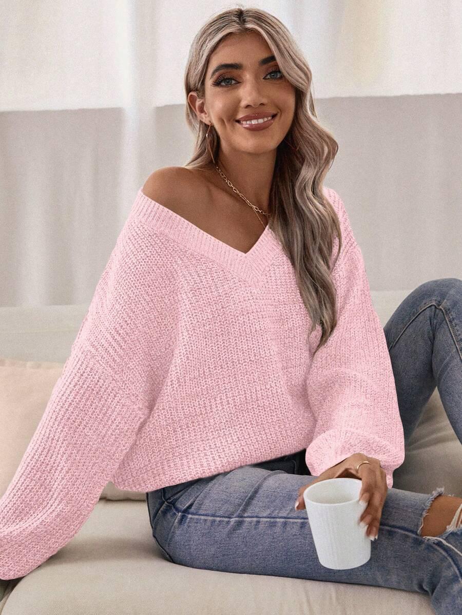 różowy sweter v-neck