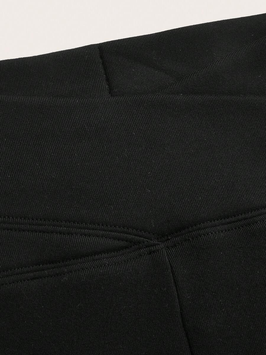 czarne legginsy asymetria