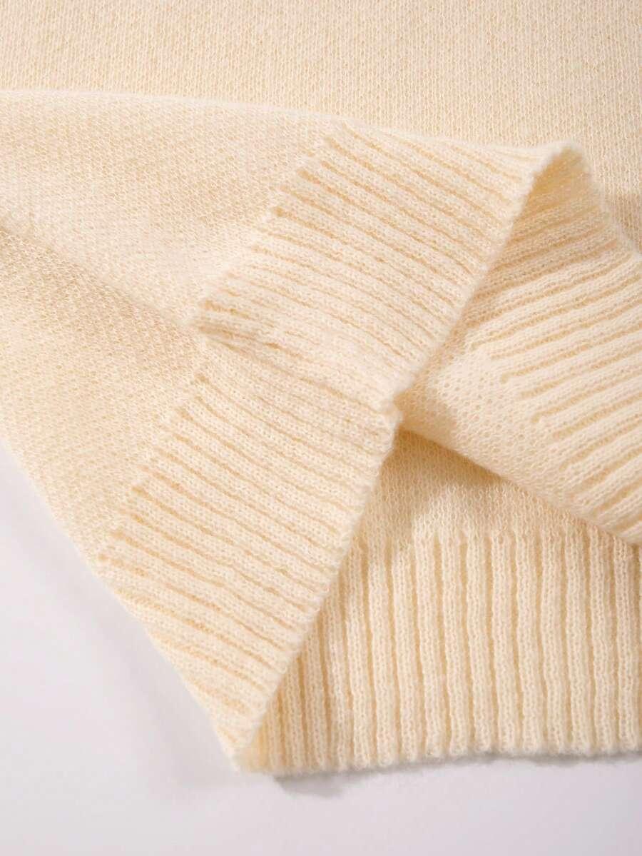 beżowy sweter okrągły dekolt