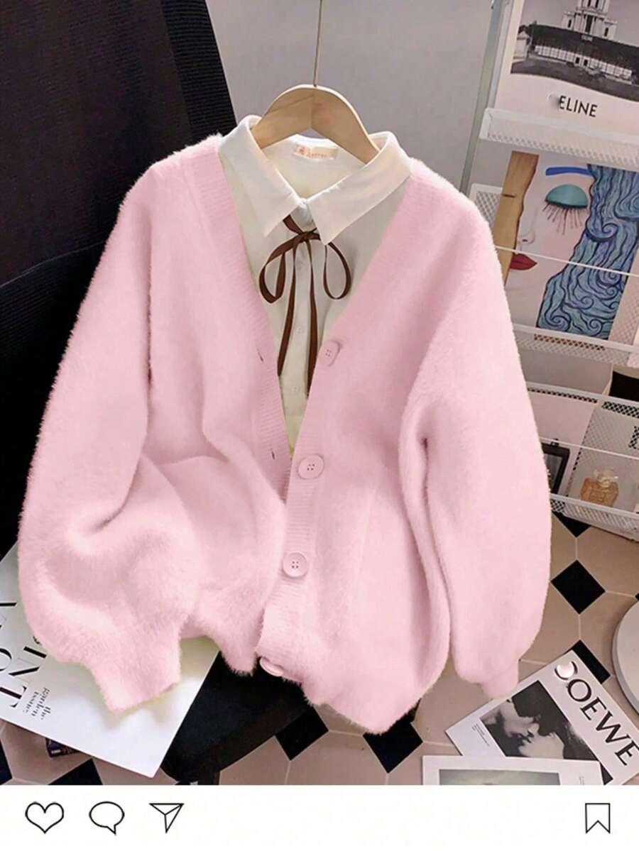 RÓŻOWY SWETER GUZIKI