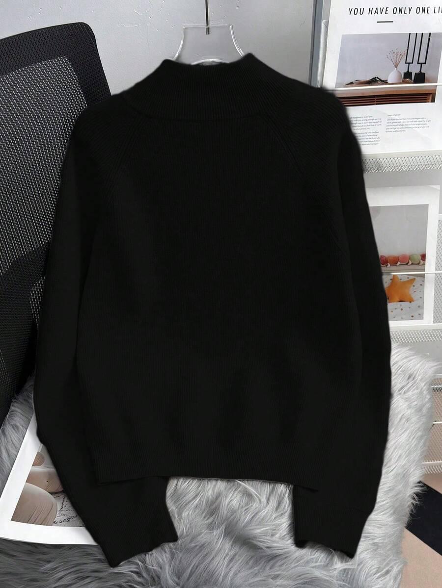 czarny sweter zamek