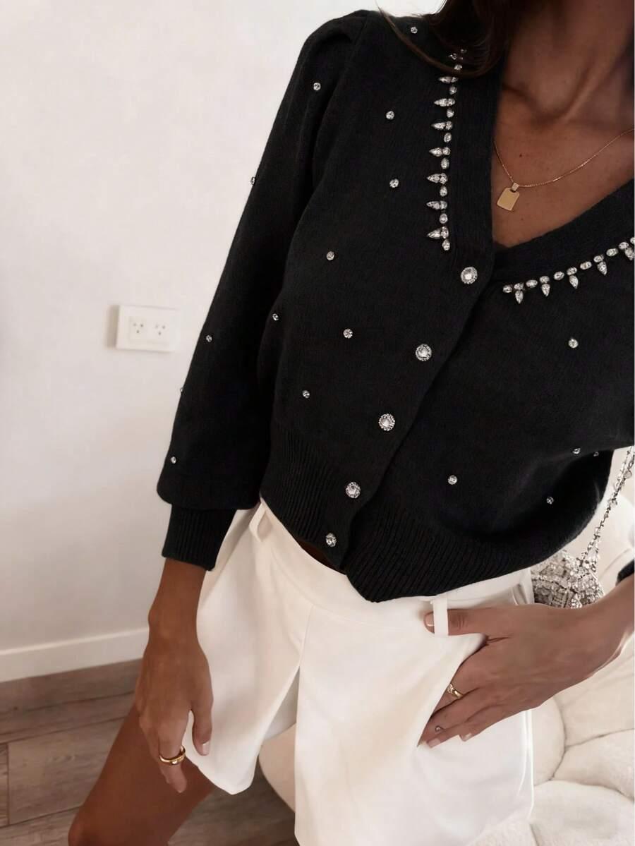 czarny dzianinowy sweter zdobienie 