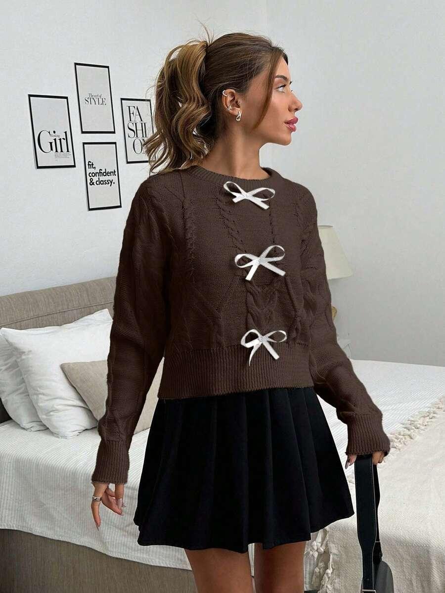 brązowy sweter kokardy