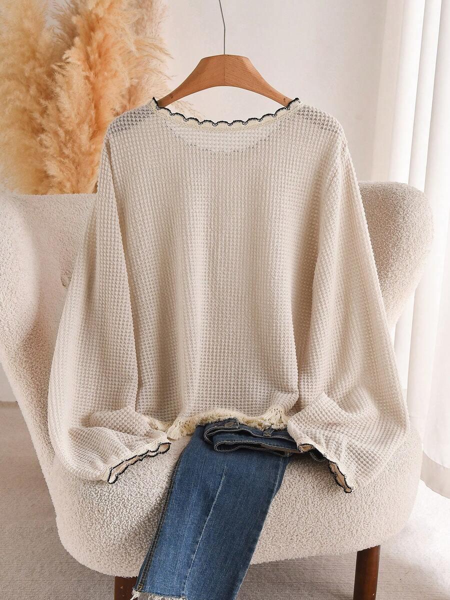 beżowy dzianinowy sweter