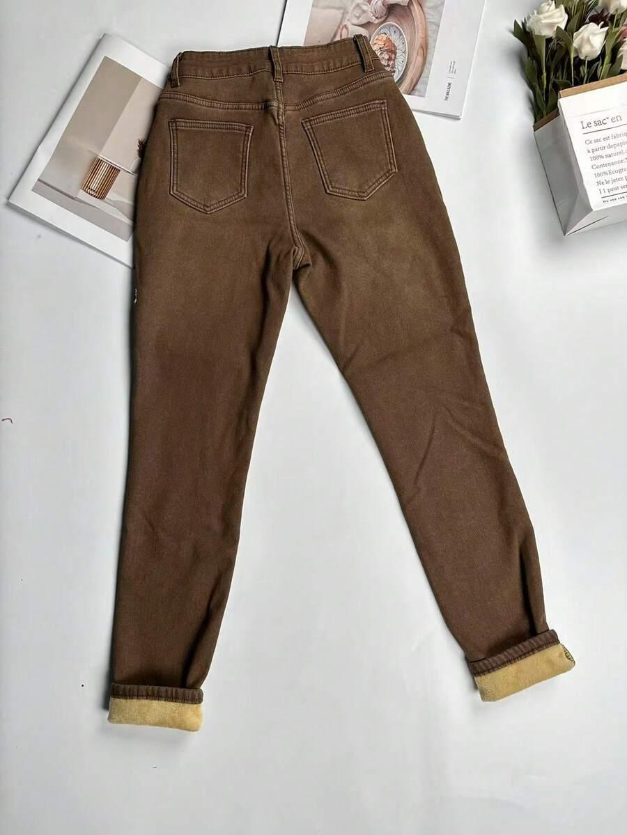 brązowe spodnie jeans ocieplane