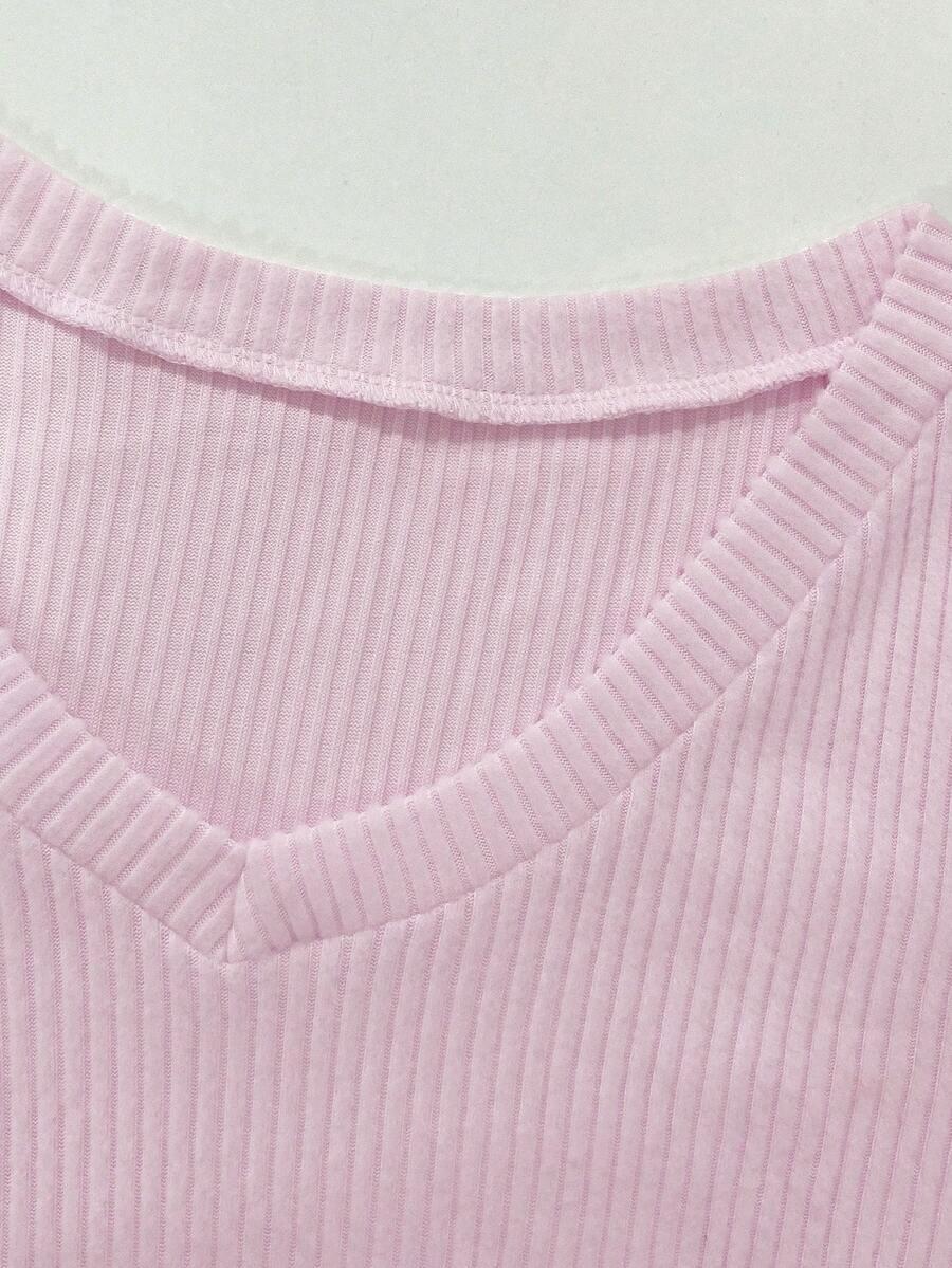 różowy sweter v-neck