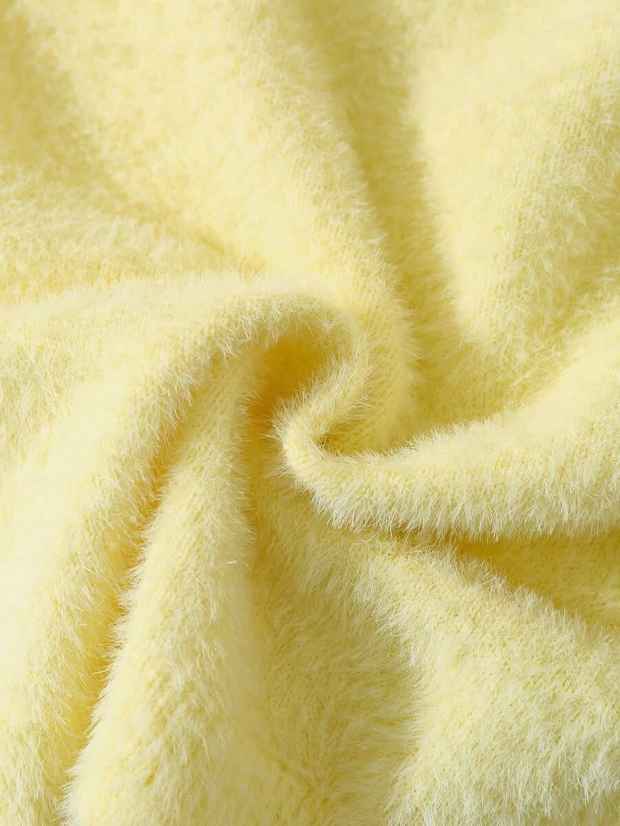 żółty sweter kardigan