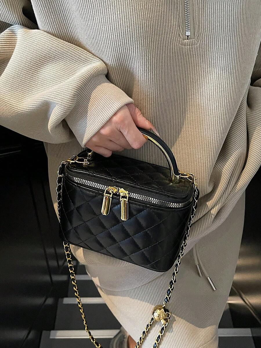 czarna torebka zip zdobinie