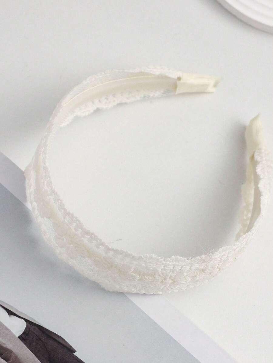 biała opaska na głowę