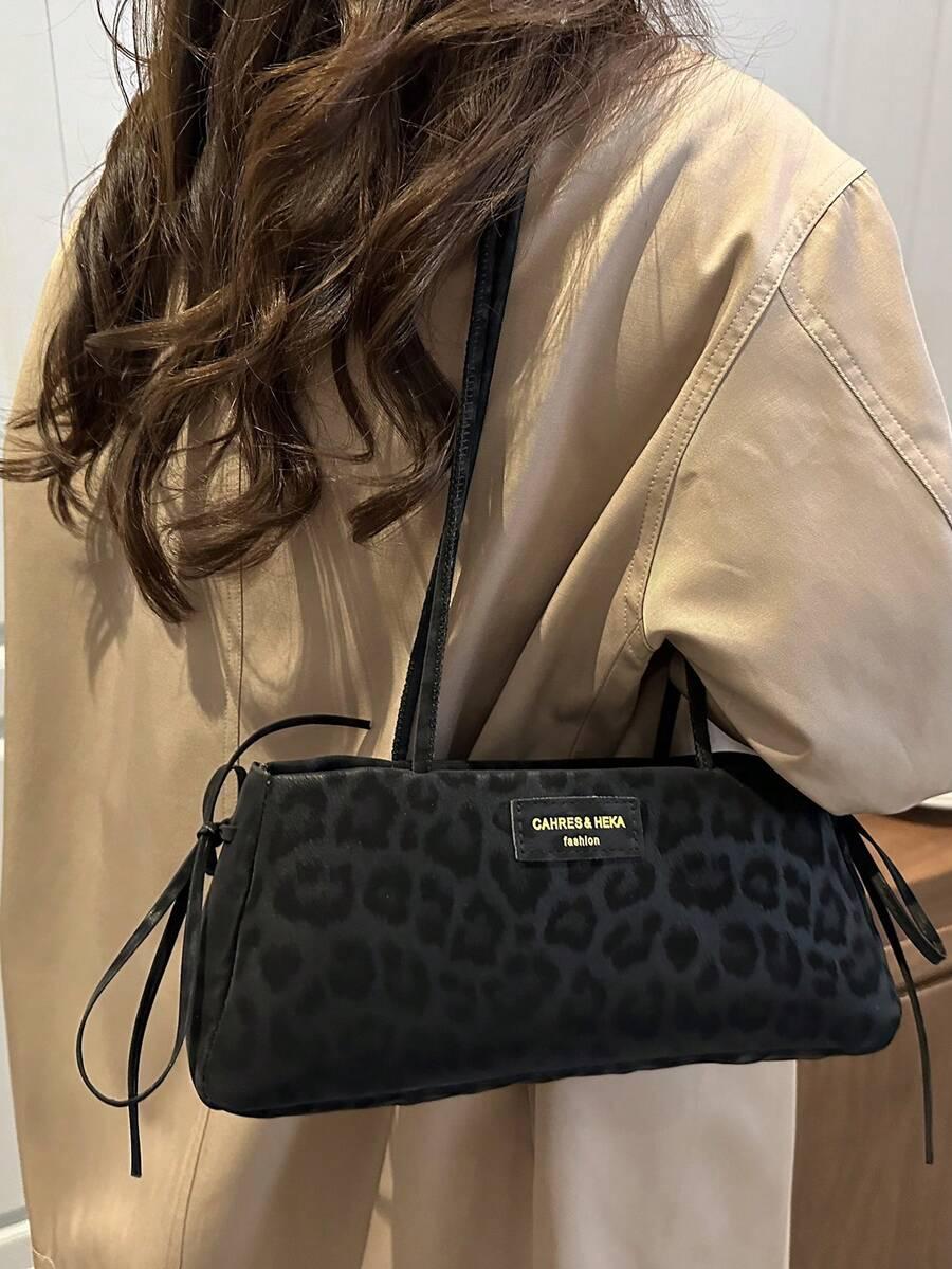 czarna torebka animal print