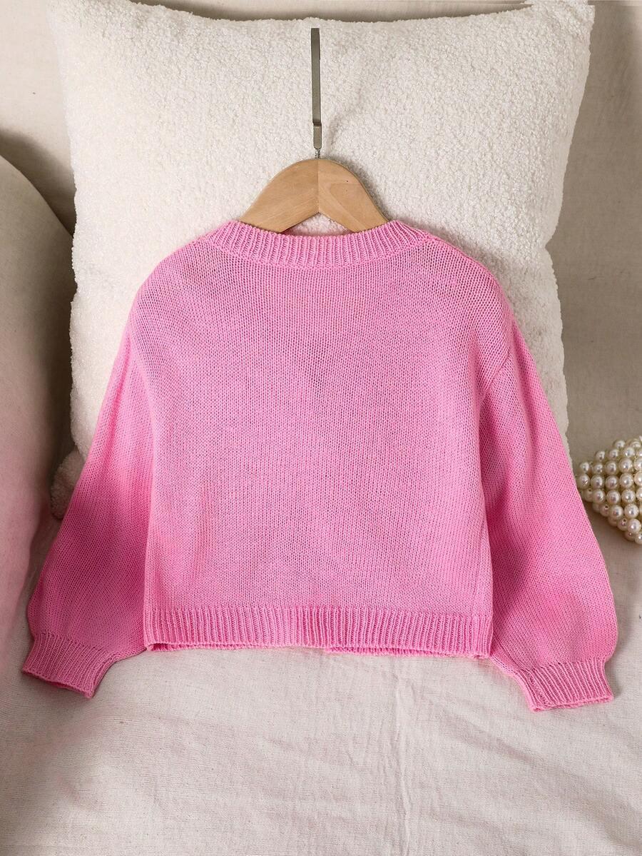 różowy sweter wiązanie
