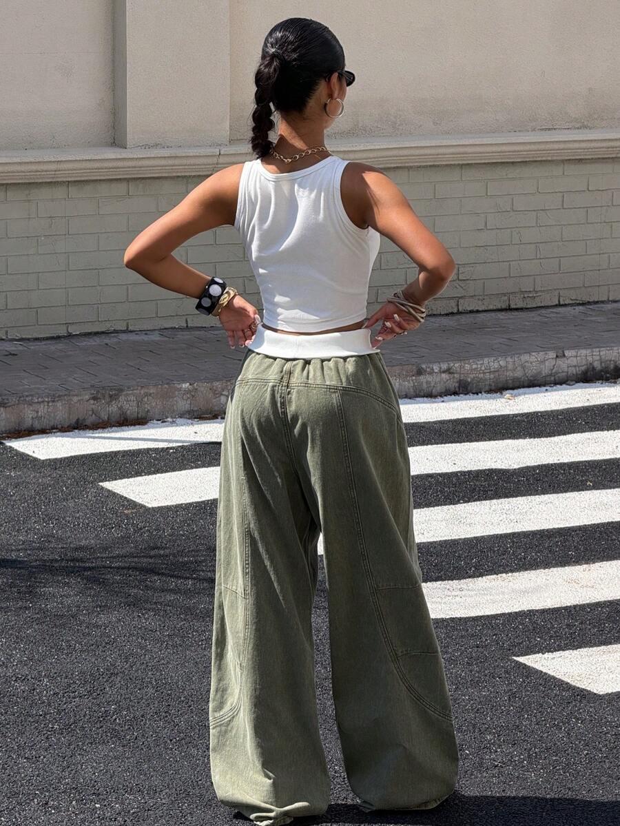 zielone spodnie jeans wide leg kontrast