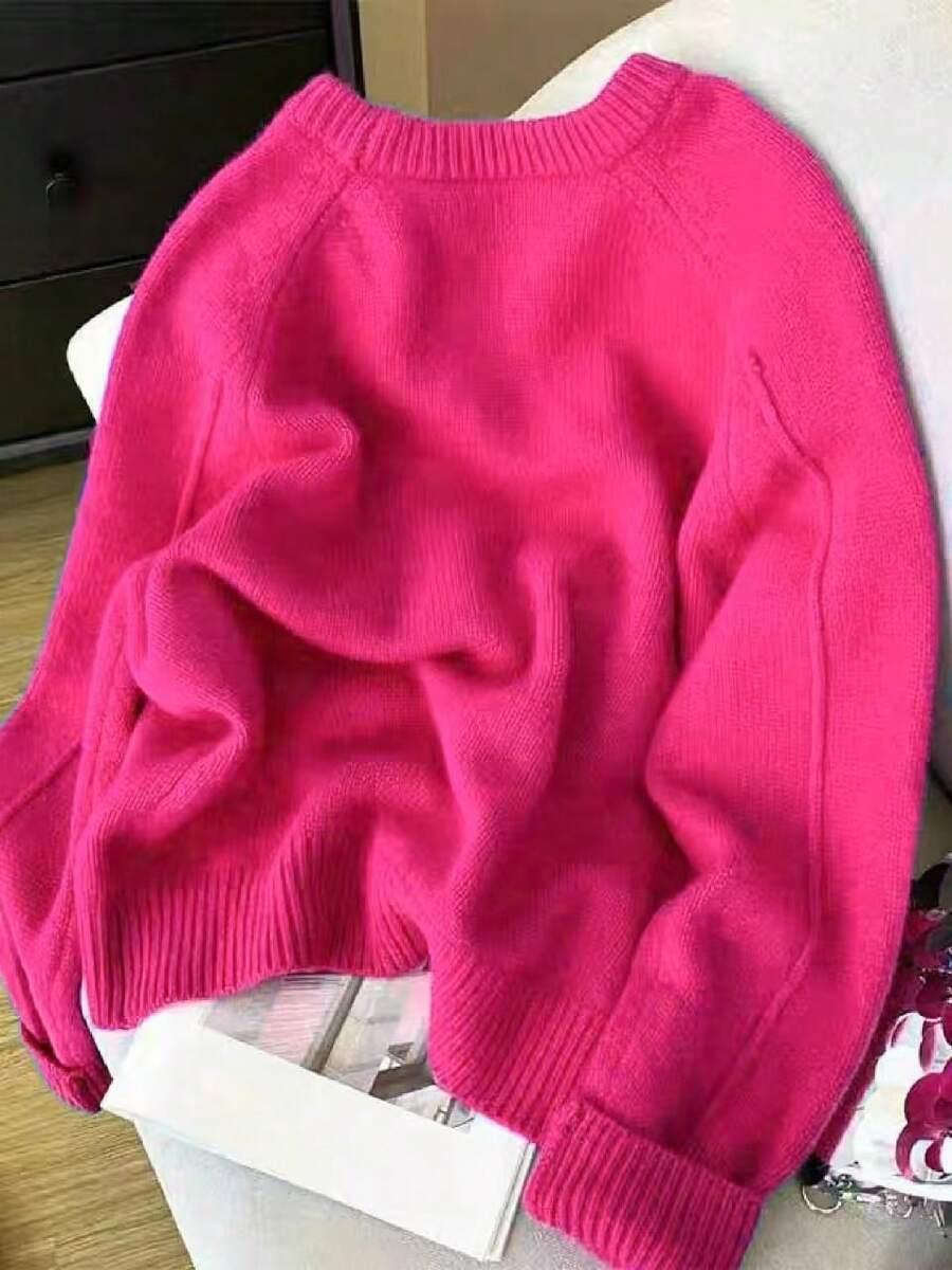 różowy sweter okrągły dekolt 