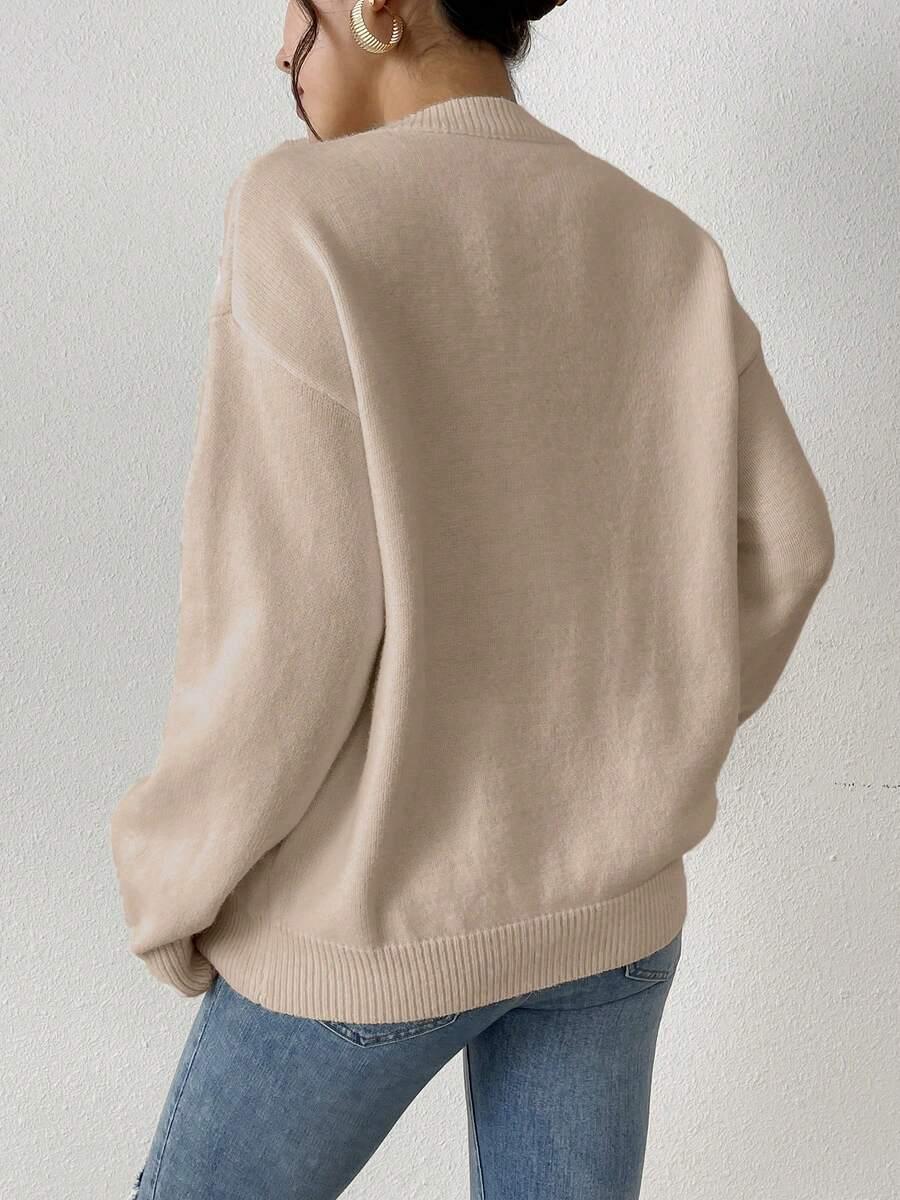 beżowy dzianinowy sweter 