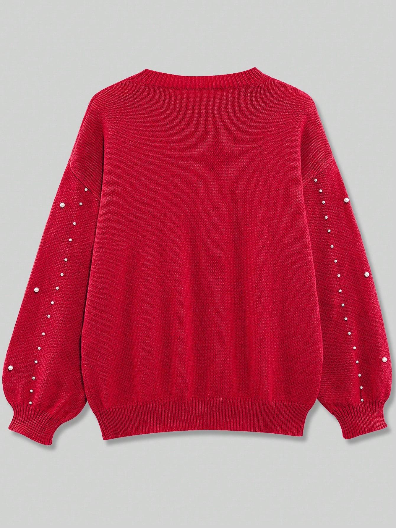 czerwony sweter zdobienie