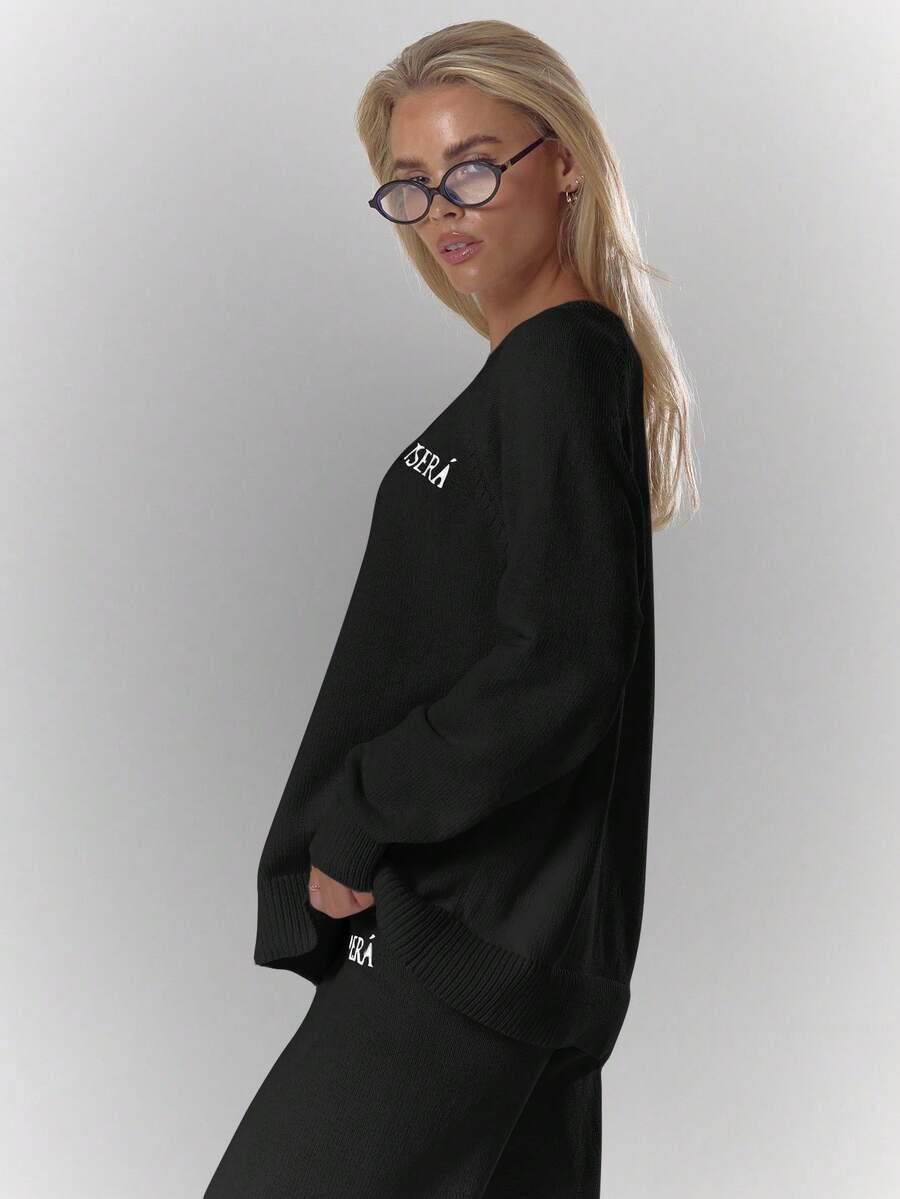 czarny sweter nadruk 