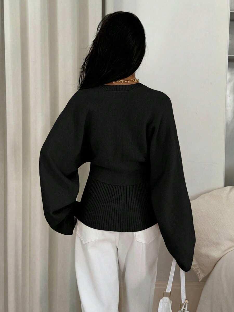 czarny sweter guziki