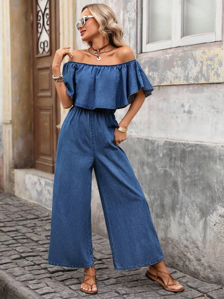 niebieski kombinezon jeans