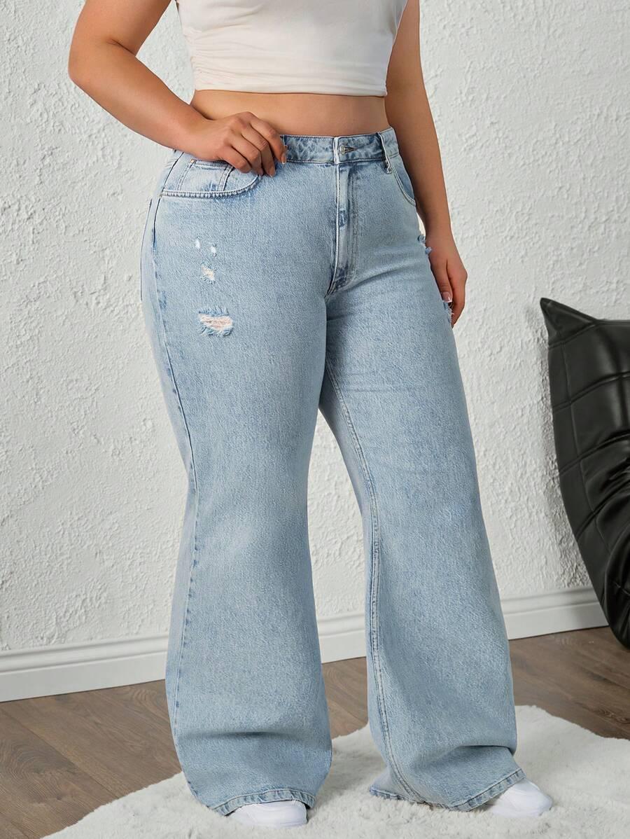 niebieskie spodnie jeans przetarcia 