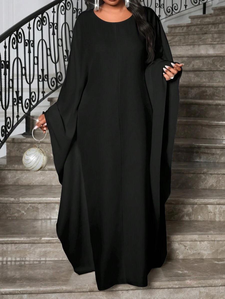 czarna sukienka oversize szerokie rękawy