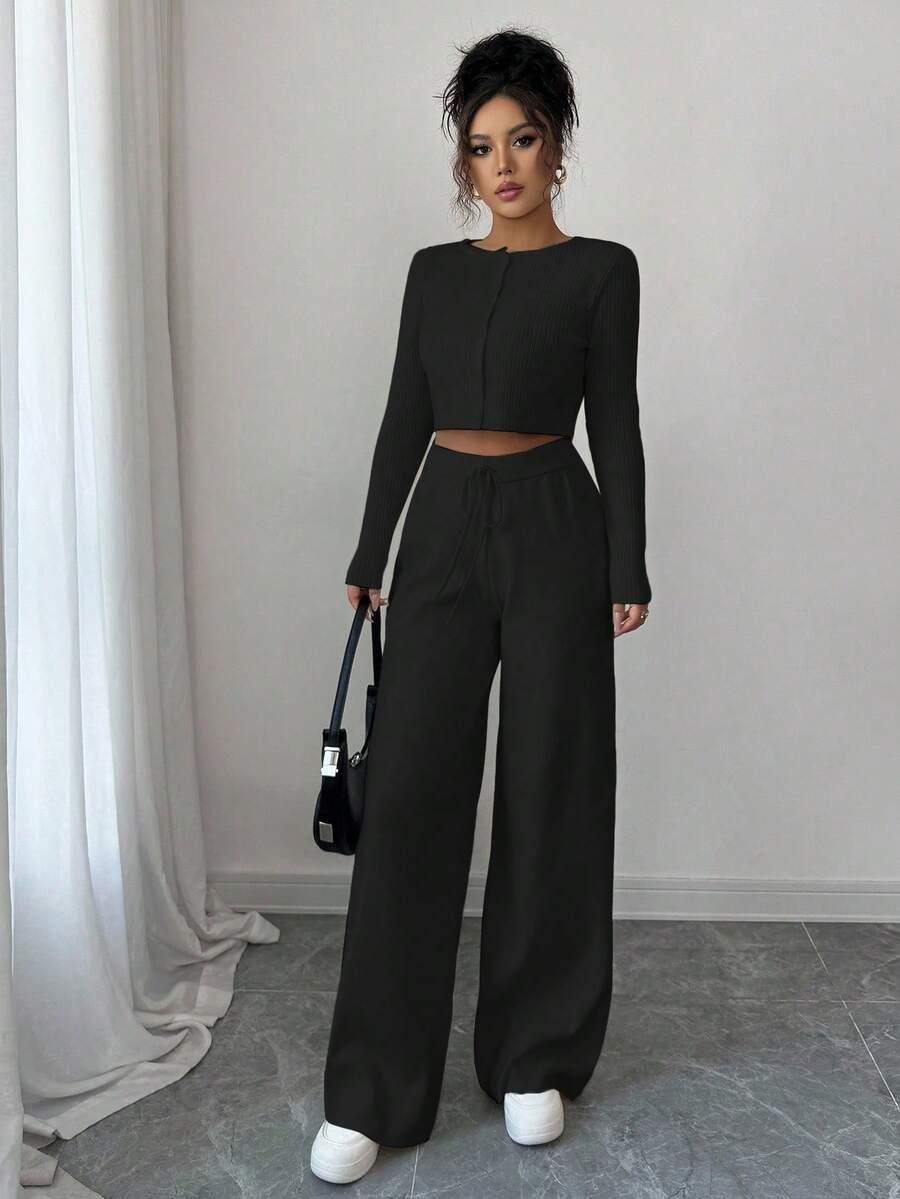 czarny dzianinowy sweter guziki 