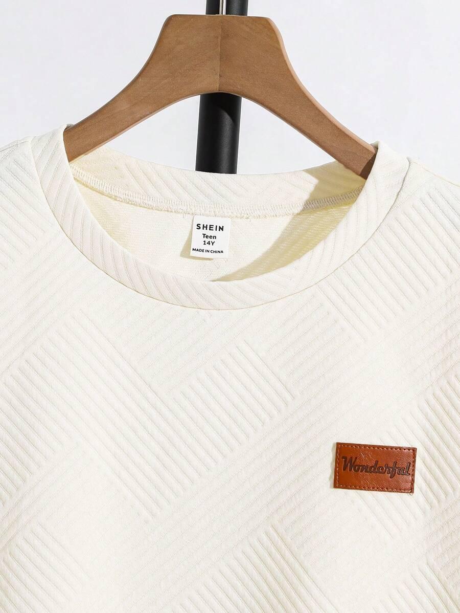 BEŻOWY T-SHIRT Z NASZYWKĄ