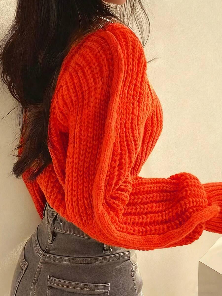 pomarańczowy sweter długi rękaw