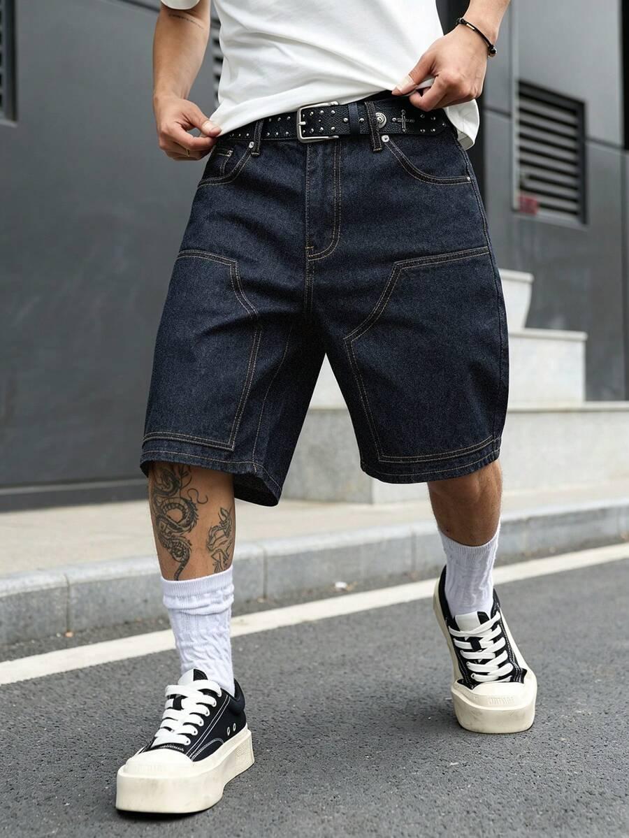 niebieskie spodenki jeans