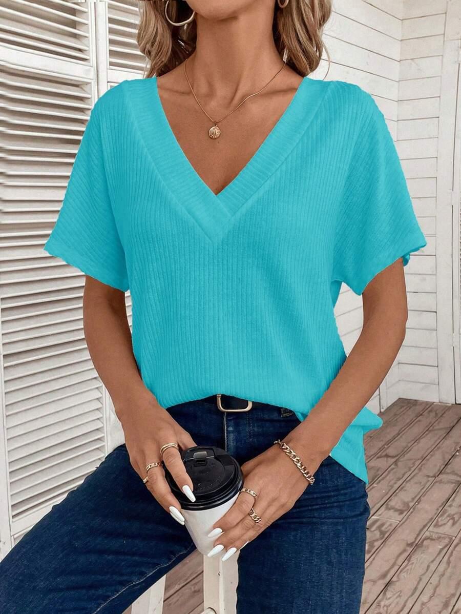 niebieska dzianinowa bluzka