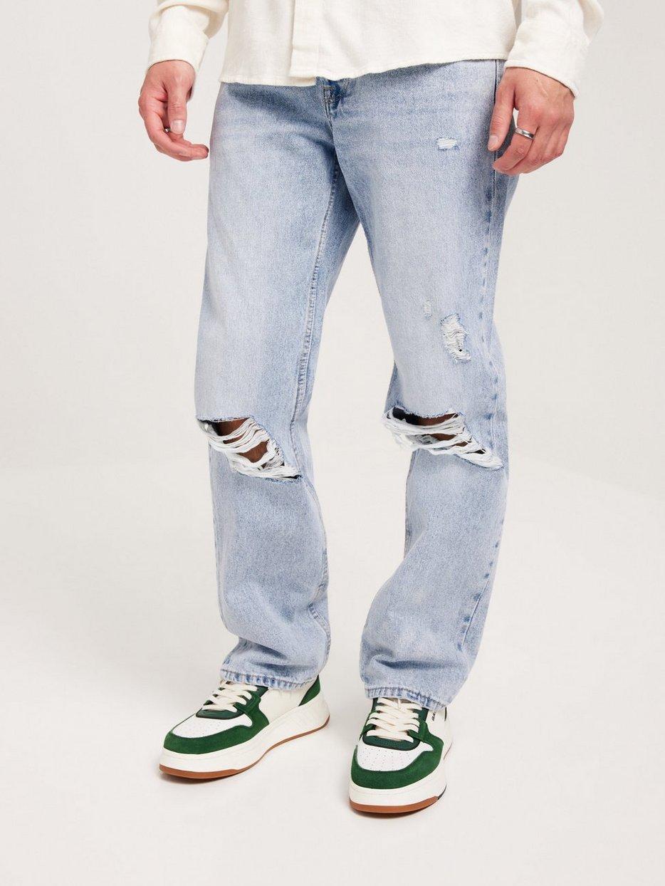 spodnie jeans przetarcia dziury guziki