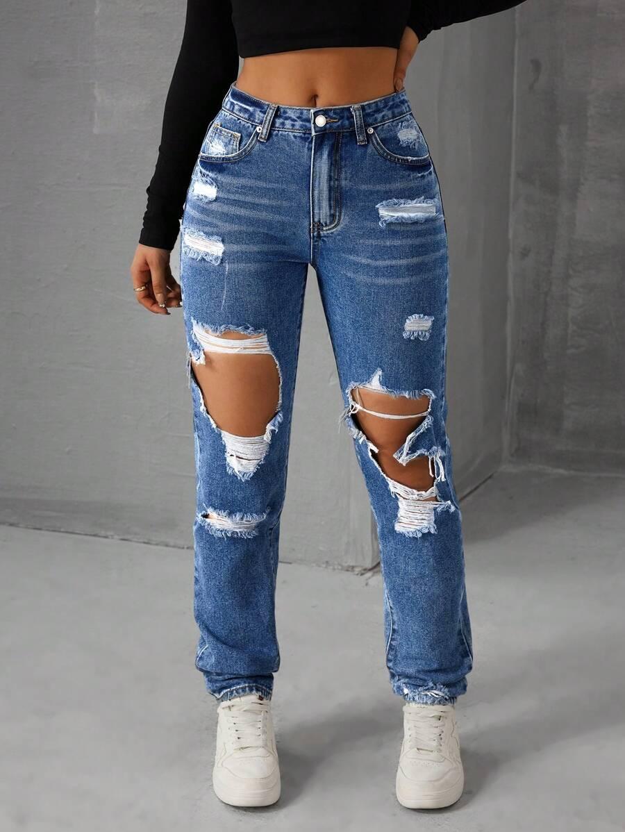 SPODNIE JEANS PRZETARCIA 