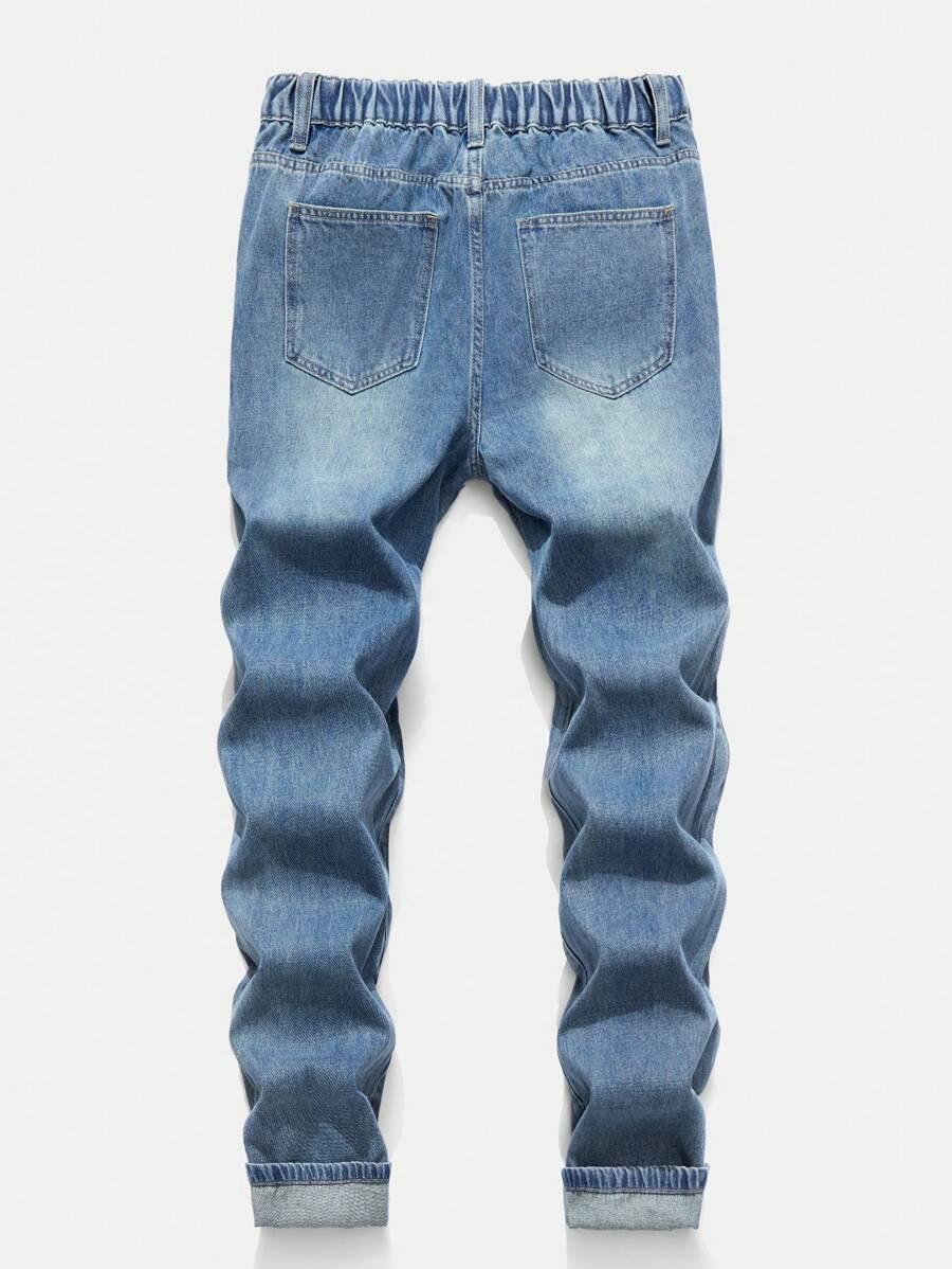niebieskie spodnie jeans