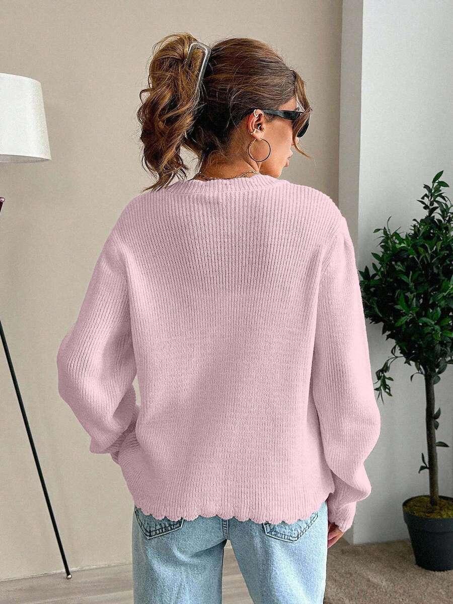 RÓŻOWY SWETER GUZIKI