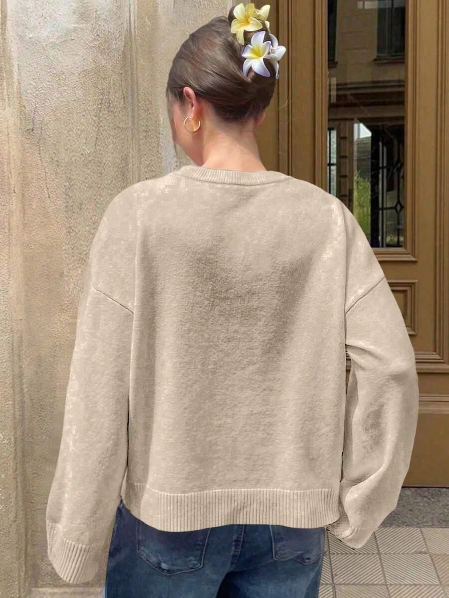 beżowy sweter długi rękaw
