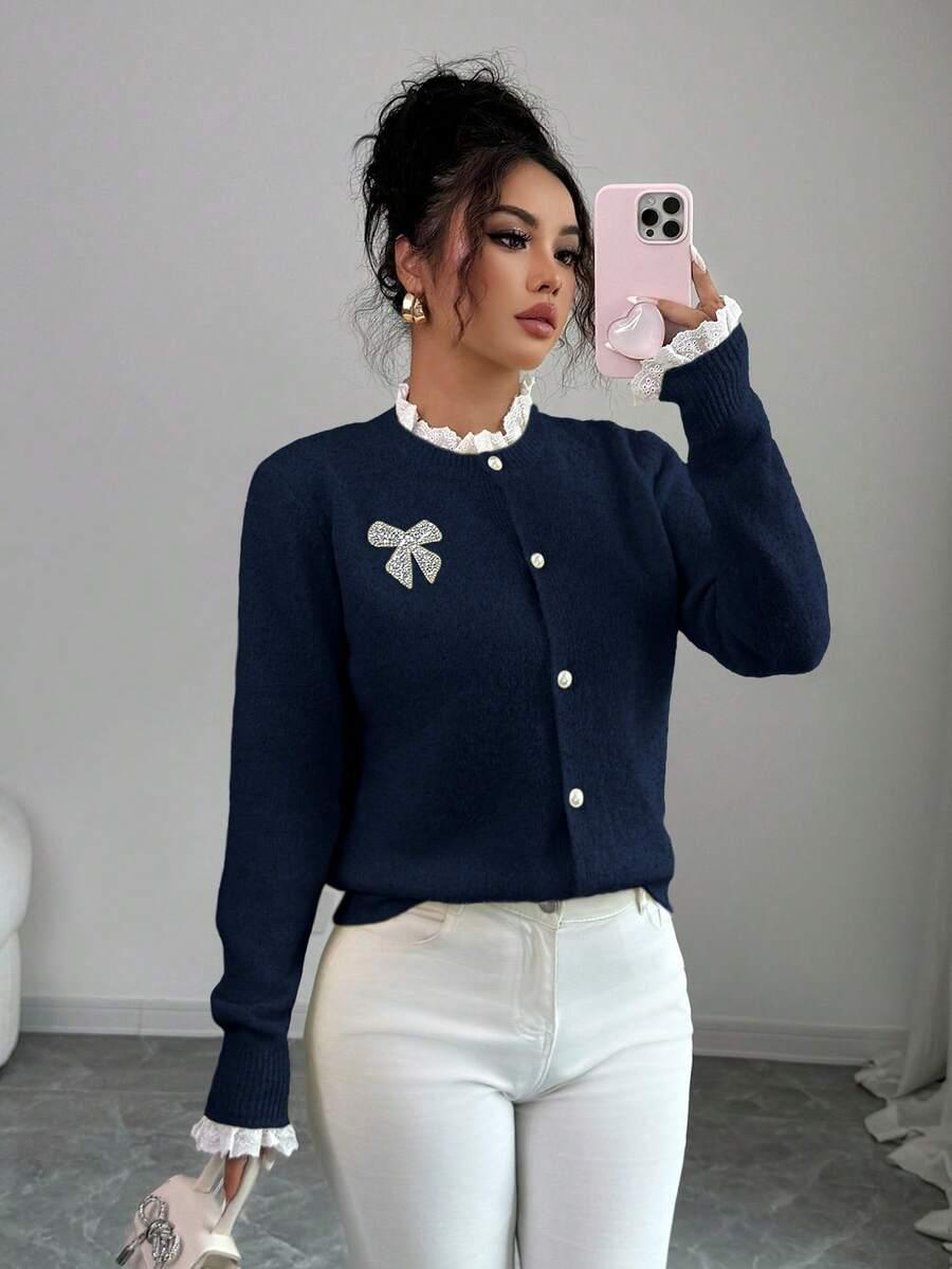 granatowy sweter długi rękaw