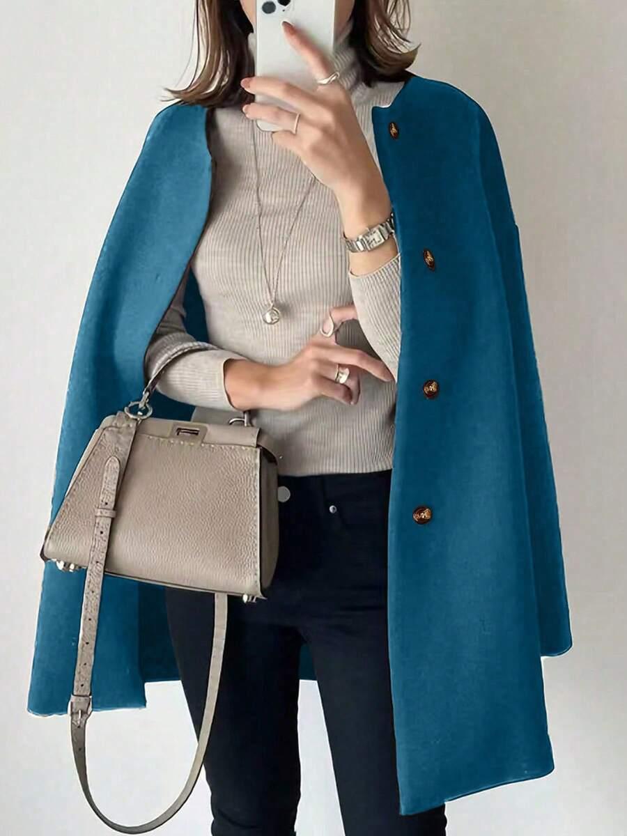 NIEBIESKI PŁASZCZ GUZIKI