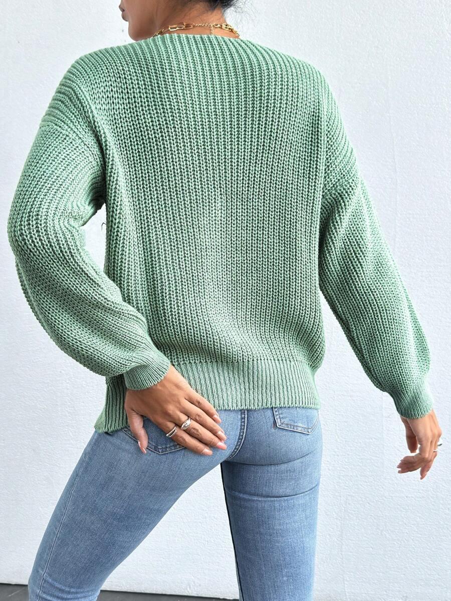 zielony sweter guziki