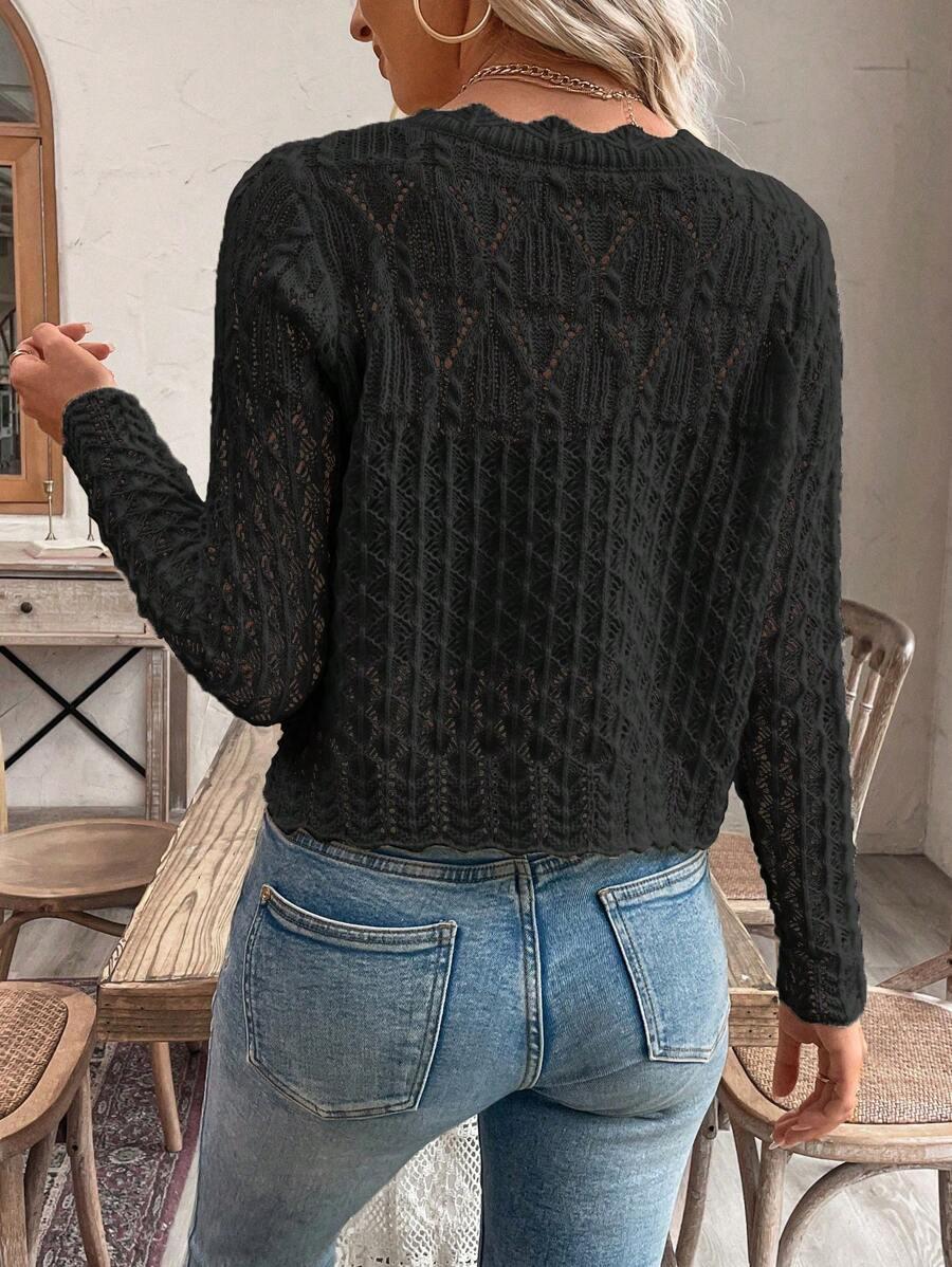 CZARNY SWETER GUZIKI