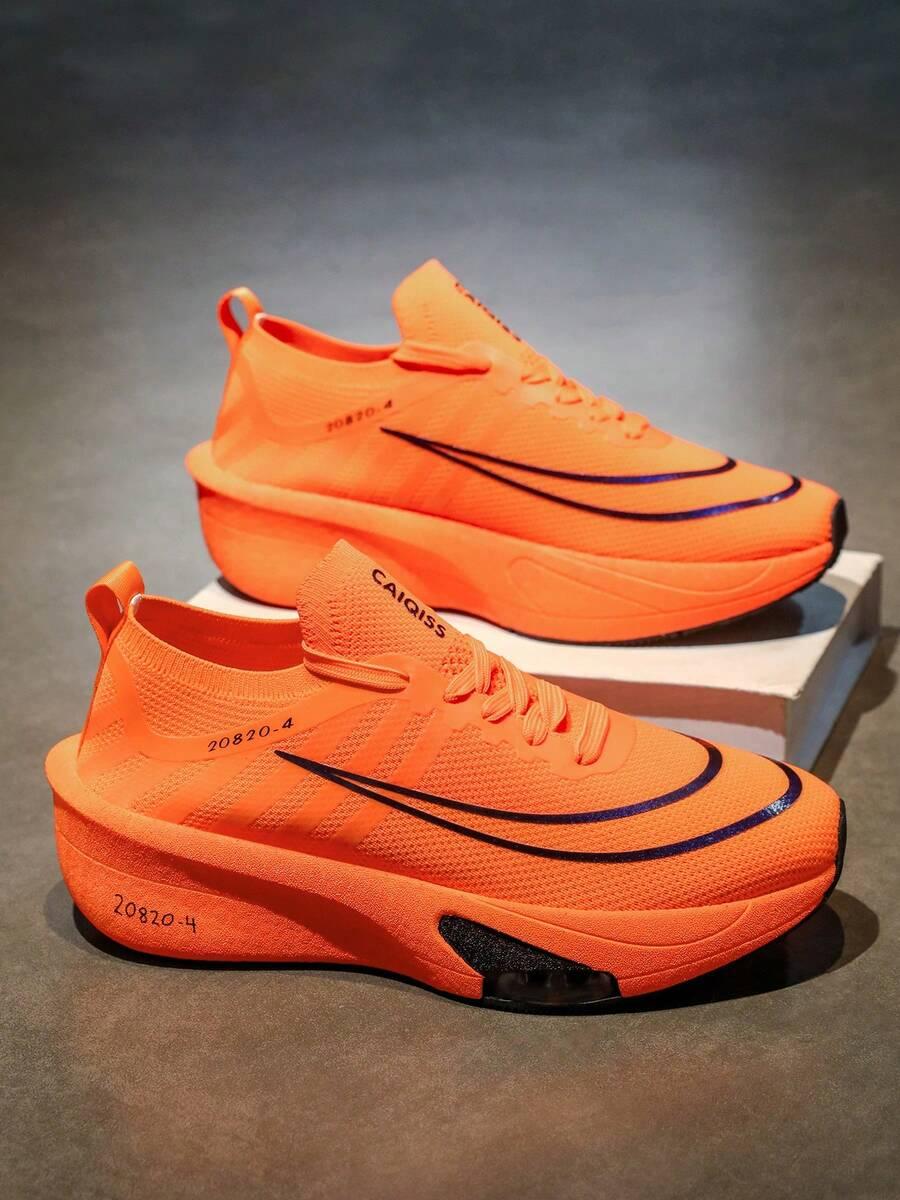 pomarańczowe buty sportowe