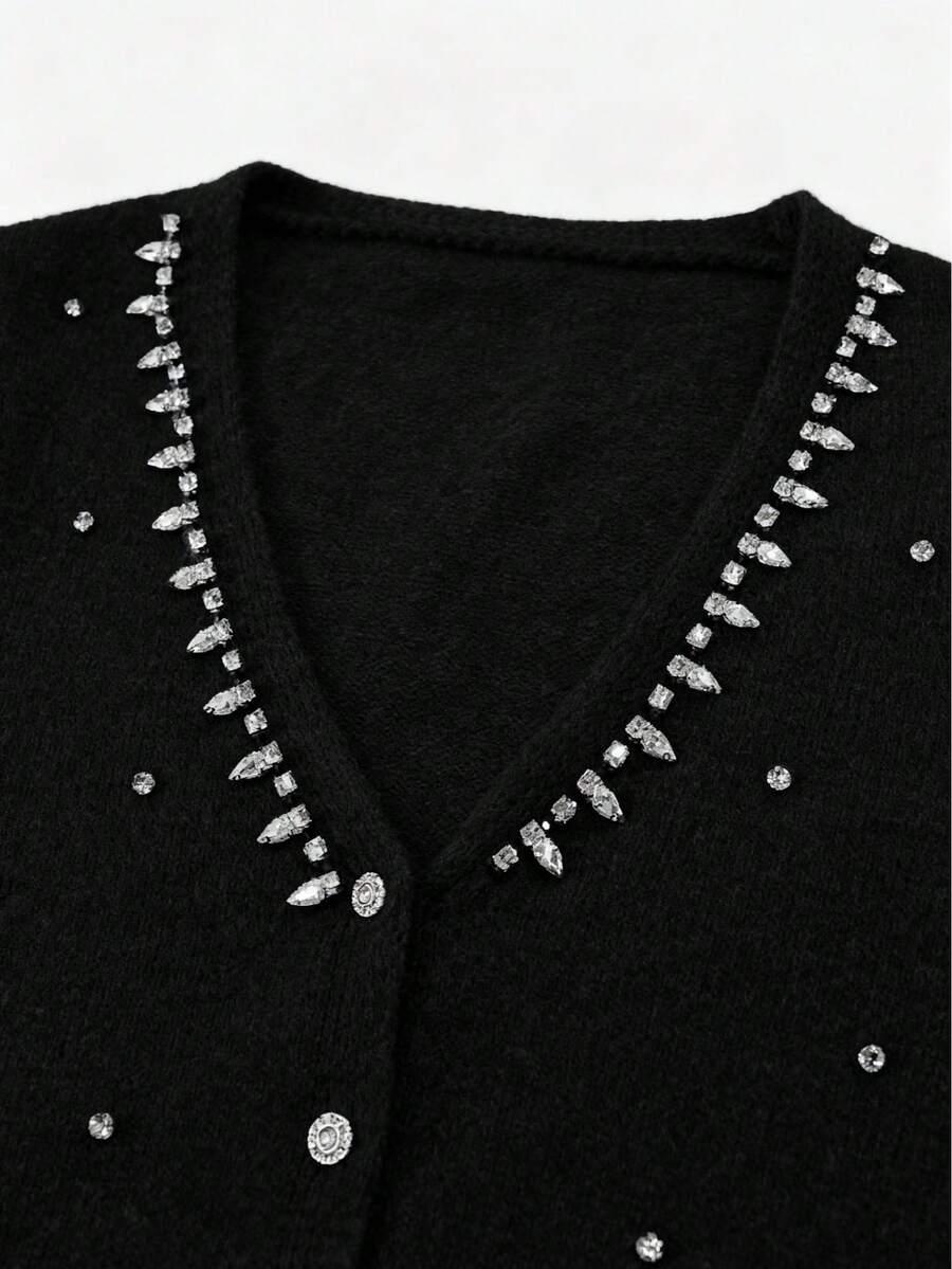 czarny dzianinowy sweter zdobienie 