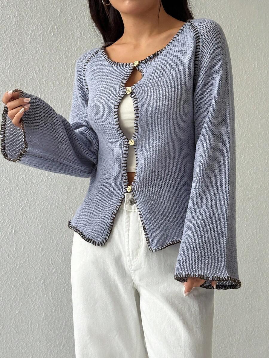 sweter guziki dzianina