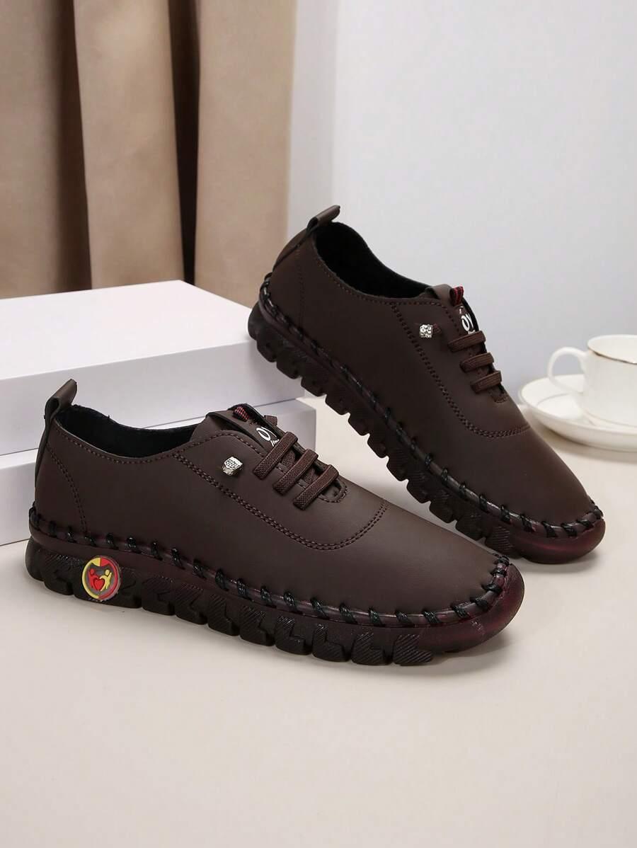 Brązowe płaskie buty