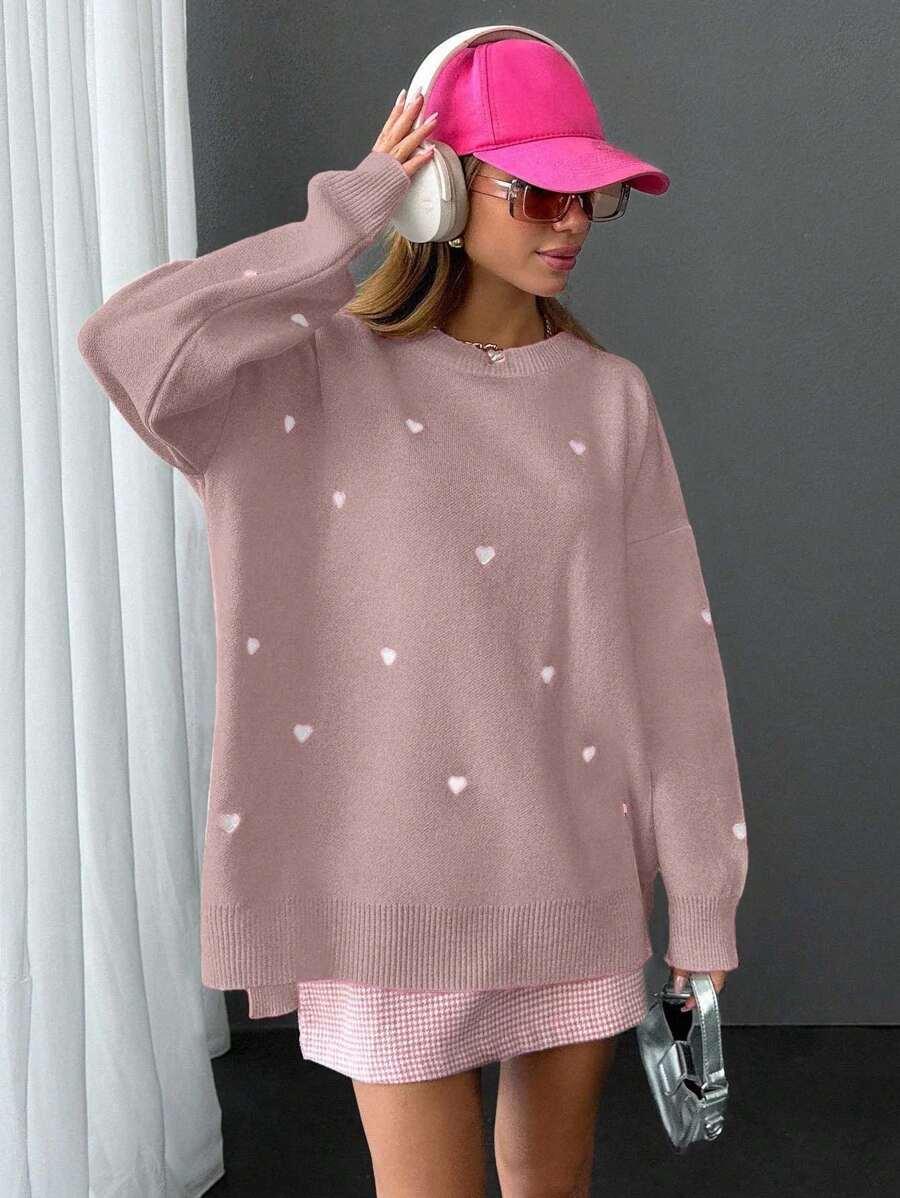 różowy sweter wzór serca