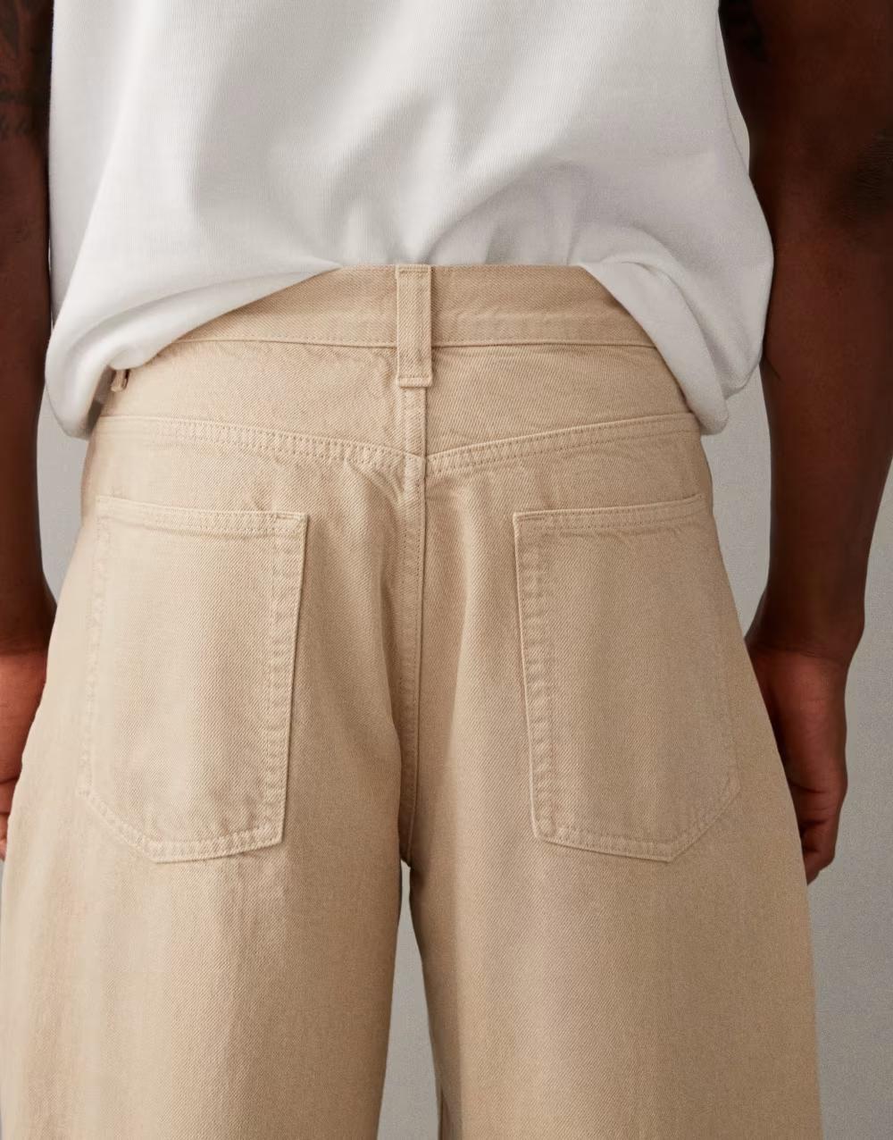 beżowe spodnie jeans zamek