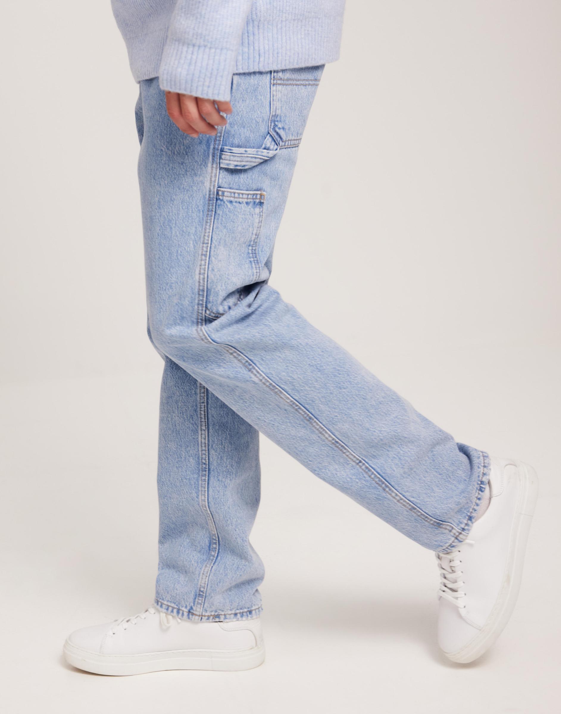 proste spodnie jeans guziki