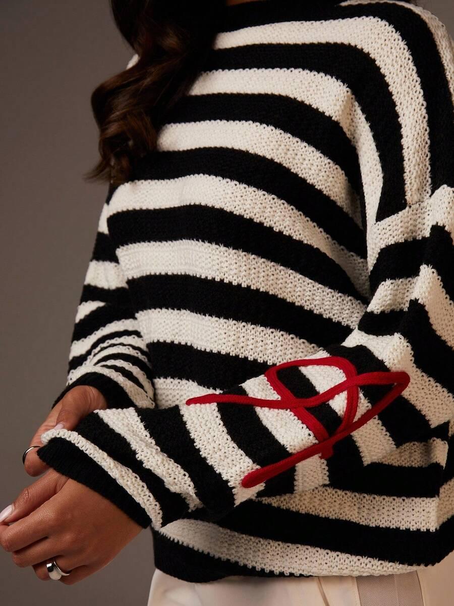 sweter w paski