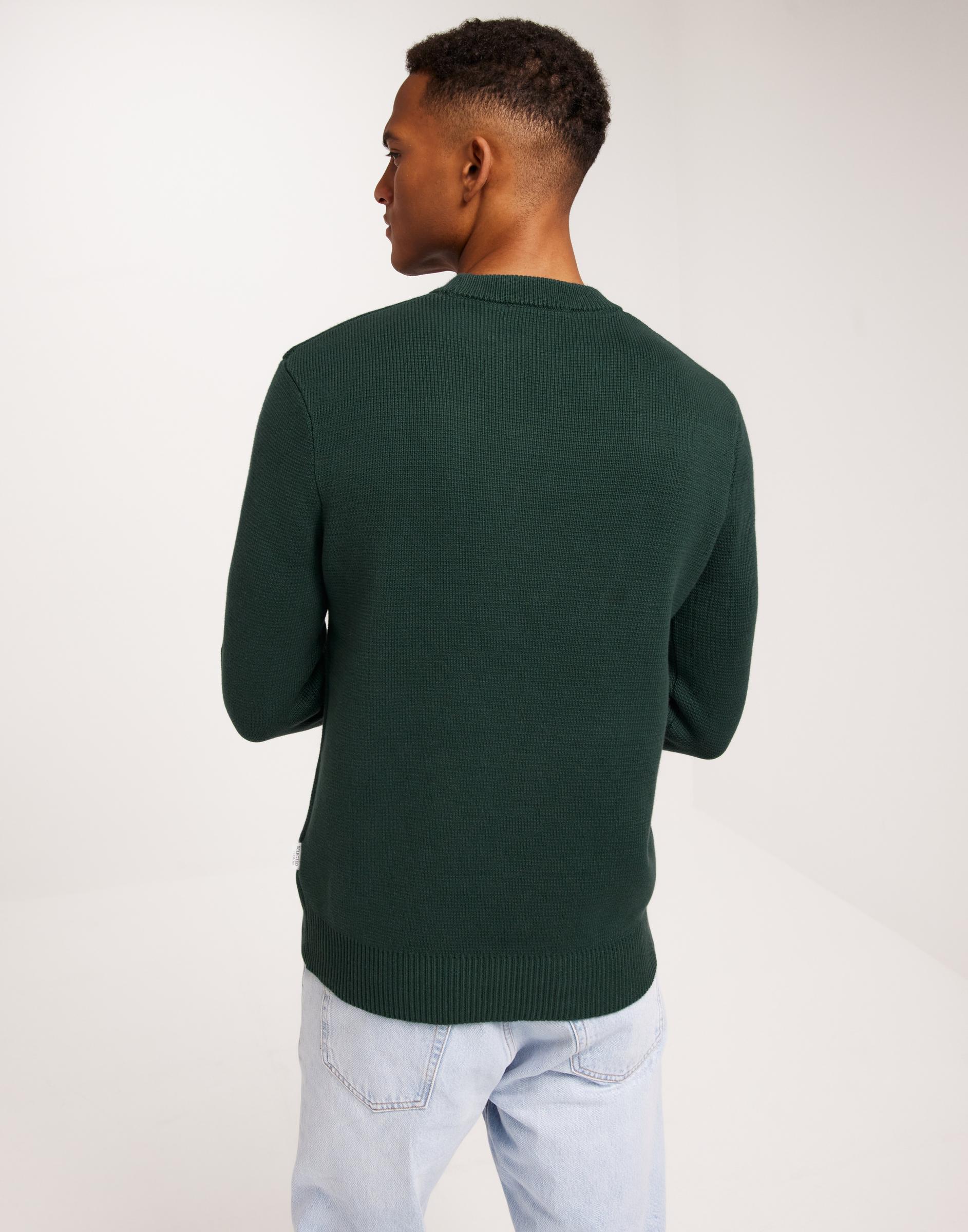 klasyczny zielony sweter tekstura okrągły dekolt