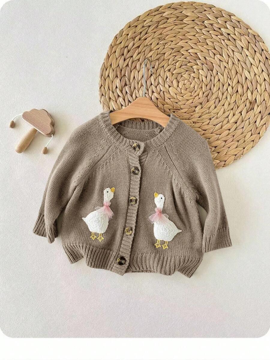 beżowy sweter guziki