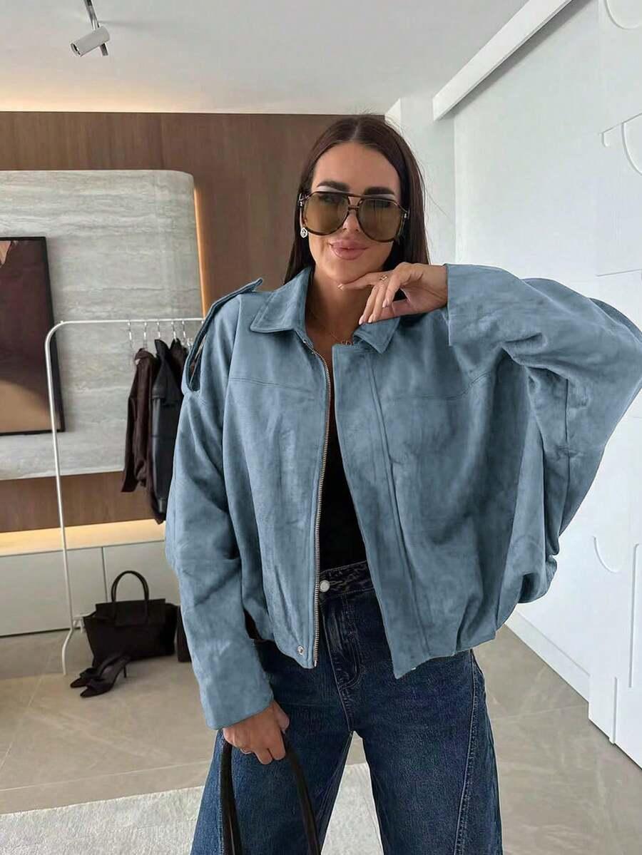 NIEBIESKA KURTKA ZAMEK
